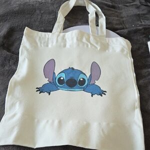 Cream Tote Bag with Blue Cartoon Character